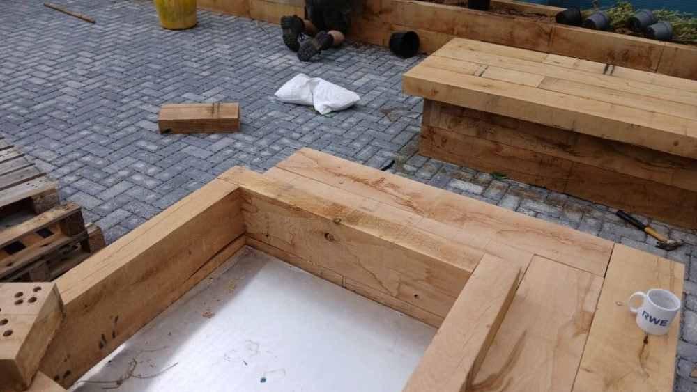 Wooden plant bedding being built