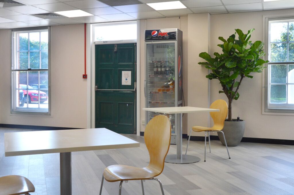 eating area with a plant in the corner