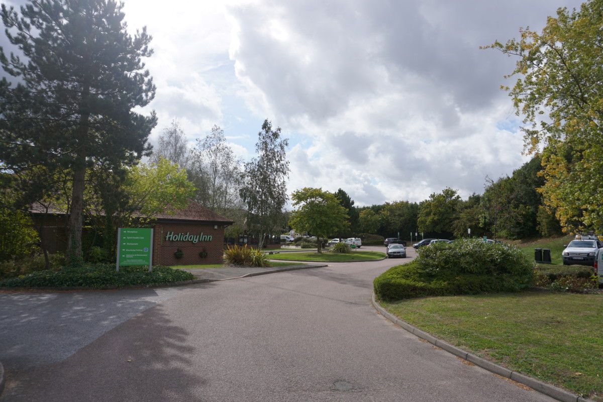 maintained lawn around a brick building
