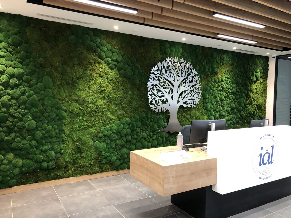 Green Wall of plants with Tree logo