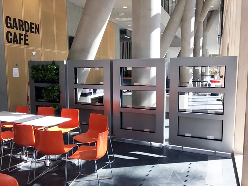 sitting area with orange chairs