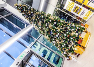 side angle of christmas tree in a building