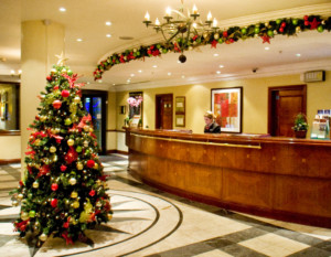 christmas tree at an angle in a reception area