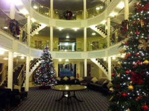 christmas trees in a three story building