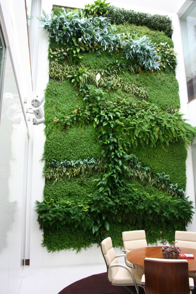 tall plant wall in a formal room