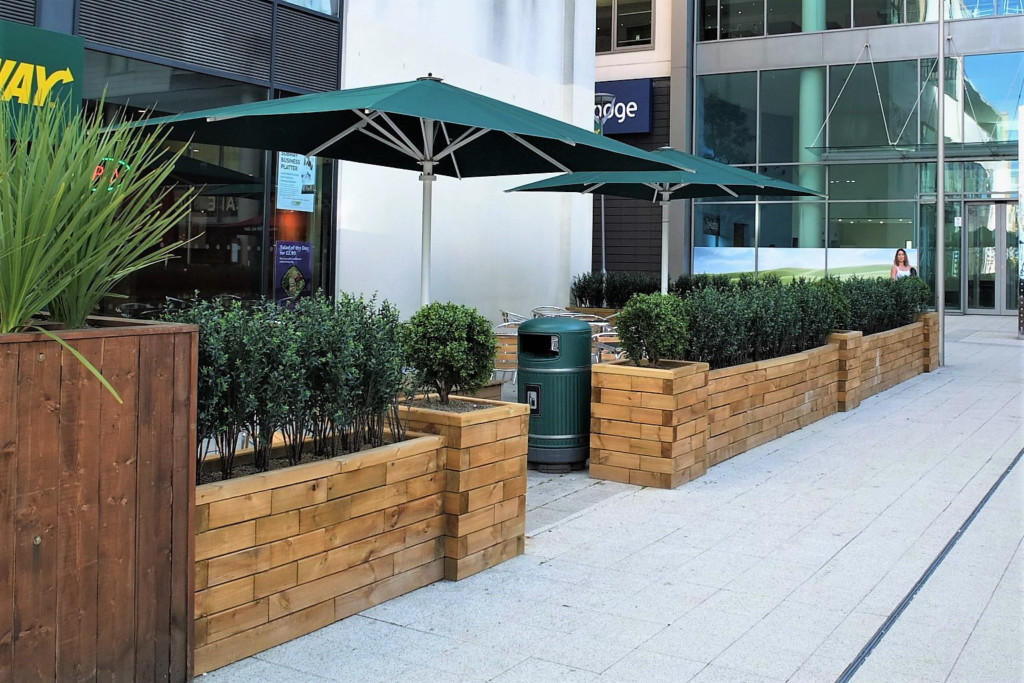 outdoor plants displayed outside an eatery place