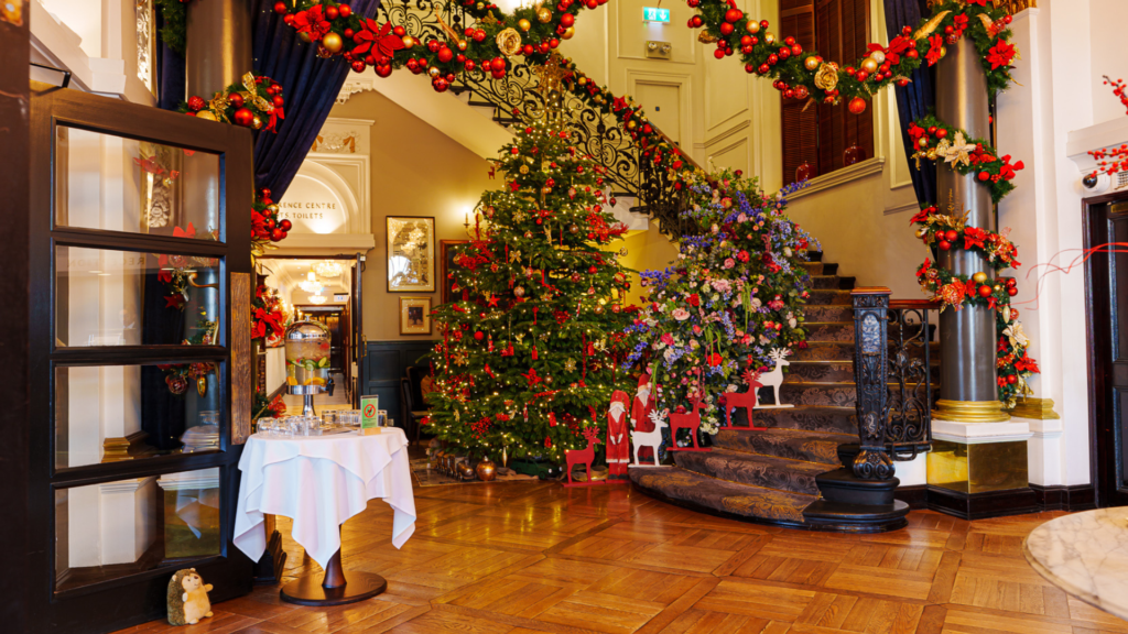 A warm atmosphere created by a classic christmas tree. Decorated with red and gold balls