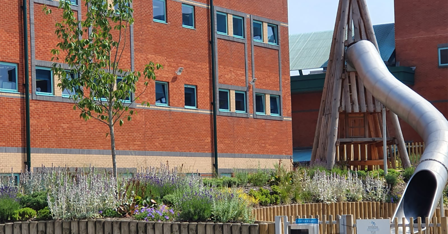 brick building by a playing area