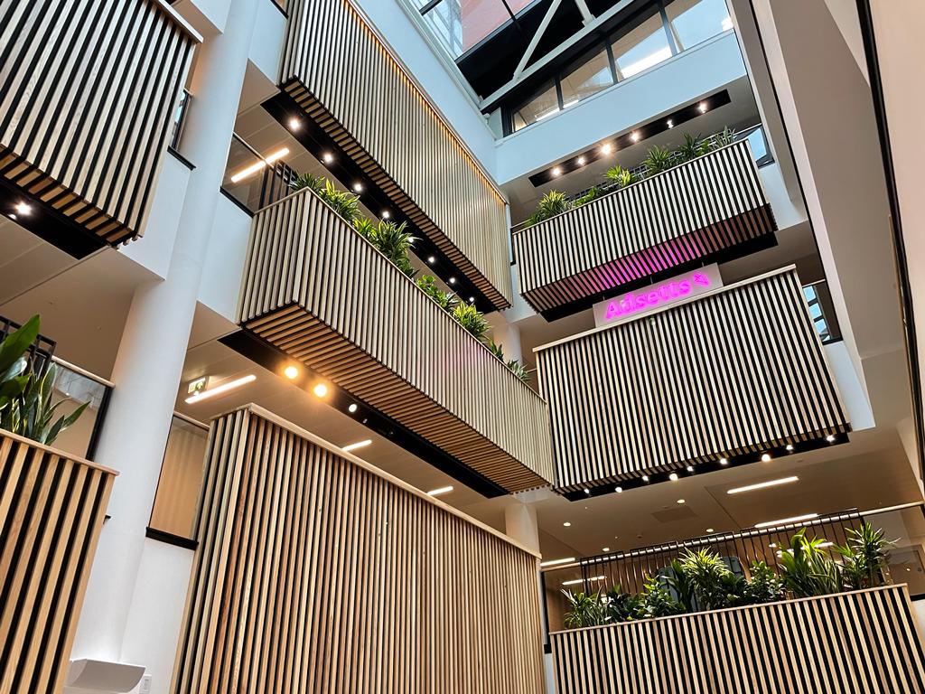 large building with indoor plant display